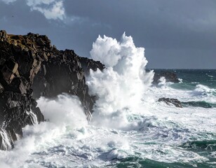 Powerful Ocean Waves Crashing Against Rocky Cliffs