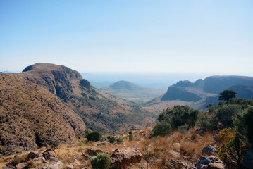 Marakele National Park safari game drive in Limpopo province, South Africa, with amazing scenic views of mountains, savanna, and wildlife habitat. The landscape combines rugged peaks, open grasslands,