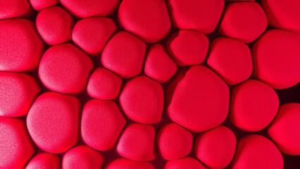 Abstract 3D rendering of red blood cells shown as rounded textured forms in bright red tones. The clustered arrangement symbolizes circulation, hematology, medical diagnostics, oxygen transport and