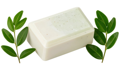 Rectangular natural soap bar accompanied by green leaves.