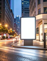 Blank vertical billboard mockup on urban street at night