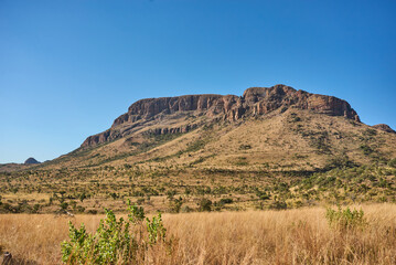 Marakele National Park safari game drive in Limpopo province, South Africa, with amazing scenic views of mountains, savanna, and wildlife habitat. The landscape combines rugged peaks, open grasslands,