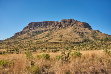 Marakele National Park safari game drive in Limpopo province, South Africa, with amazing scenic views of mountains, savanna, and wildlife habitat. The landscape combines rugged peaks, open grasslands,