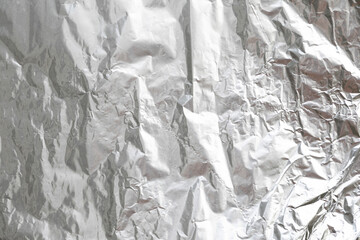 Shiny silver gray foil background or texture,horizontal shape with space for design.