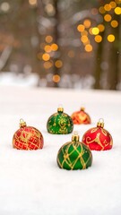 Christmas ornaments on snow