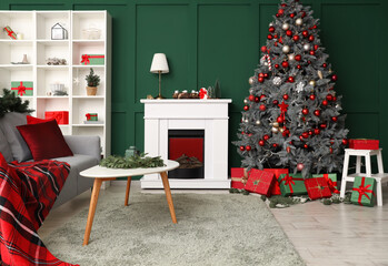 Stylish interior of modern living room with beautiful Christmas tree and fireplace