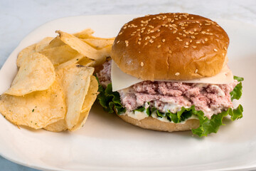 spam salad sandwich with  chips