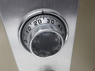 Unlocking Financial Security: Vintage Safe Dial Guards Hidden Treasures, Confidential Assets, and Valuable Secrets with Industrial Precision