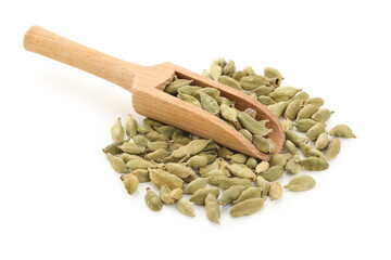 Wooden scoop with cardamom spice on white background