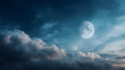 A luminous full moon illuminates a dynamic and cloudy twilight sky showcasing serene blue hues and dramatic cloud formations
