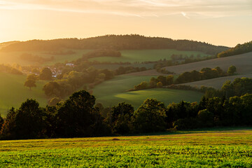 Golden Sunset Over Rolling Hills