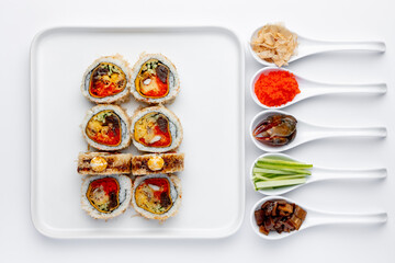 Sushi roll with crab on a white background isolated with ingredients