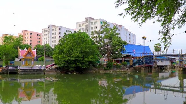 Life village houses along Prem Prachakon canal river Bangkok Thailand.
