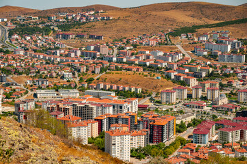 Fototapeta premium August 28, 2025 Yozgat Turkey. Aerial view of Yozgat City in Turkey. View of Yozgat city from Nohutlu Tepe Municipal Facilities.Yozgat State City Hospital is visible.