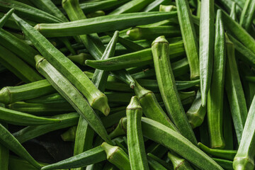 fresh ladyfinger selling at the dry market or fresh market fruit and vegetable stall
