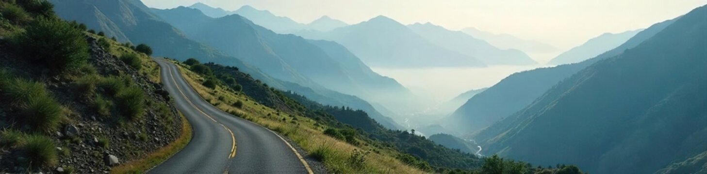 A winding road disappearing into a misty mountain range symbolizes the long and sometimes unclear path of patience, requiring perseverance to reach the destination , distance, patience, challenge