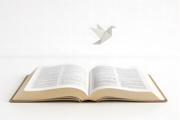 Fototapeta premium Open Book with Origami Paper Crane: Symbolizing Creativity, Imagination, and Tranquility in Literature and Education