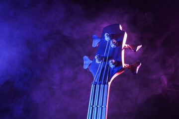 Modern electric guitar on dark background, closeup © Pixel-Shot