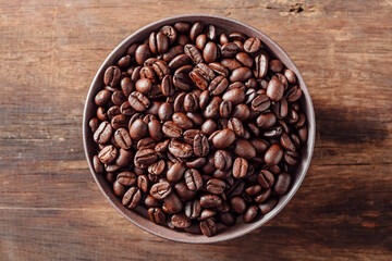 Freshly Roasted Coffee Beans in Bowl on Wooden Table Surface