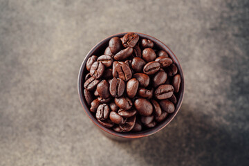 Close-Up of Freshly Roasted Coffee Beans in a Bowl on Surface