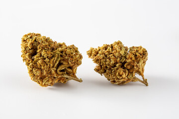 Close-Up View of Two Natural Cannabis Buds on White Background