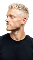 Obraz premium Profile of a Young Man with Blonde Hair and Short Beard Wearing a Black T Shirt Against a White Background