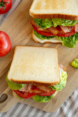 Homemade BLT (Bacon Lettuce Tomato) Sandwich with Mayo, top view.