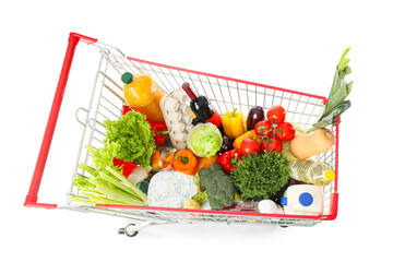Shopping cart with different fresh products on white background