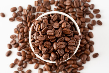 Freshly Roasted Coffee Beans in White Bowl Surrounded by Grains