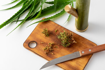 Fresh Herbal Preparation on a Wooden Cutting Board with Knife