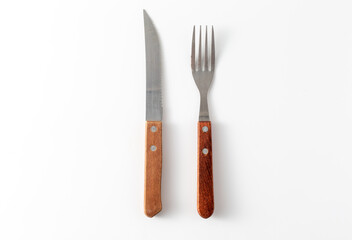 Stainless Steel Knife and Fork with Wooden Handle on White Background