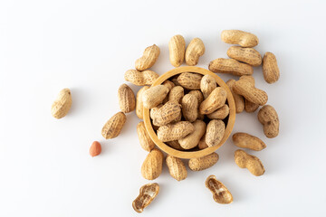Natural Shelled Peanuts in a Wooden Bowl on White Background