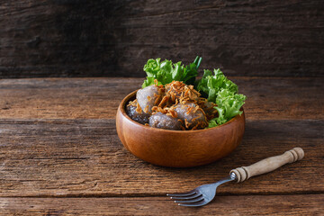 Delicious Bowl of Fresh Green Vegetables with Savory Meatballs
