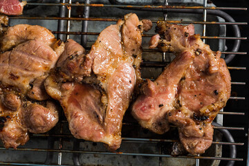 Grilled Meat on Rack with Charred Texture and Appetizing Appearance