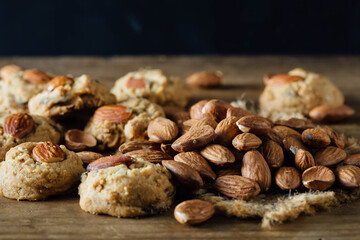 Delicious Homemade Cookies with Almonds on Rustic Wooden Surface