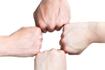 Group of hands joining in strength. A group of four fists joined together in a gesture of teamwork, strength, and unity. Business, team, partnership, success, support, community, cooperation, power