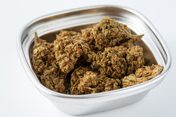 Close-up of Dried Cannabis Flower in Metal Container