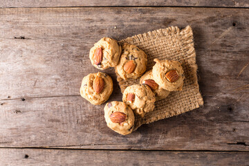 Freshly Baked Almond Cookies on Rustic Wooden Table Surface