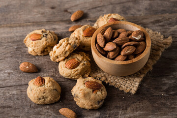 Freshly Baked Cookies with Almonds and Nuts on Wooden Table