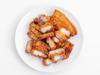 Crispy Golden Pork Belly Slices on White Plate for Delicious Meal