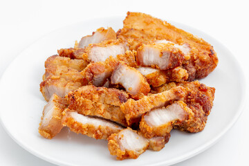 Crispy Fried Pork Belly Pieces on White Plate for Culinary Delight