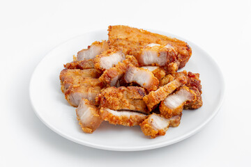 Crispy Fried Pork Belly Slices on a White Plate Ready to Serve