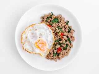 Savory Ground Meat Stir-Fry with Fried Egg on White Plate