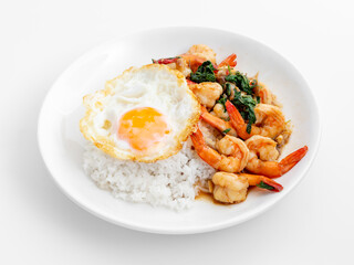 Delicious shrimp stir-fry with fried egg over rice in white bowl