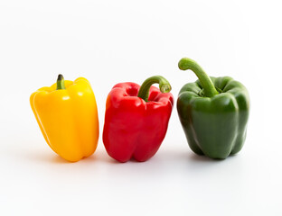 Colorful Bell Peppers on White Background for Culinary Use