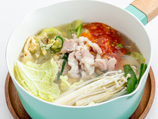 Fresh Hot Soup with Vegetables and Meat in a Colorful Pot