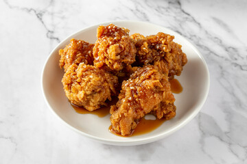 Crispy Fried Chicken with Sweet Sauce on a White Plate