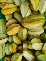 Pile of fresh delicious star fruit or Carambola open sell  in Indian market.
