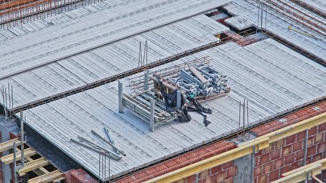 Office Building Construction Site with Rebar Reinforcement Rods Precast Concrete Ceiling Slabs