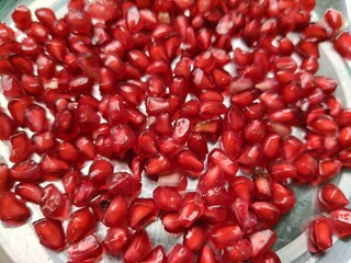 pile of fresh pomegranate seeds.